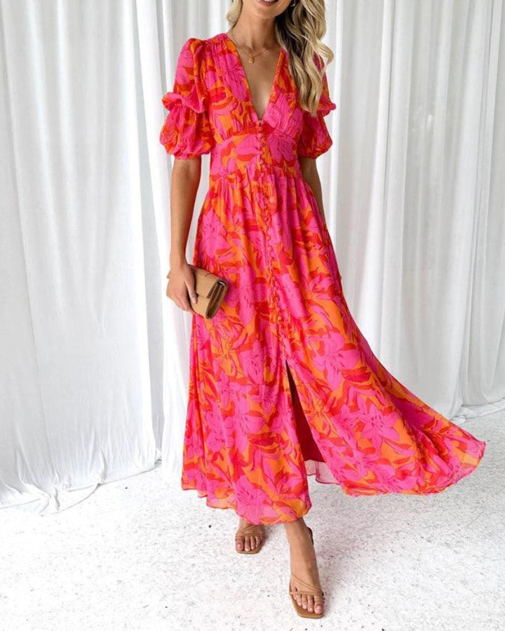 Clara – Robe longue élégante à col en V et manches bouffantes