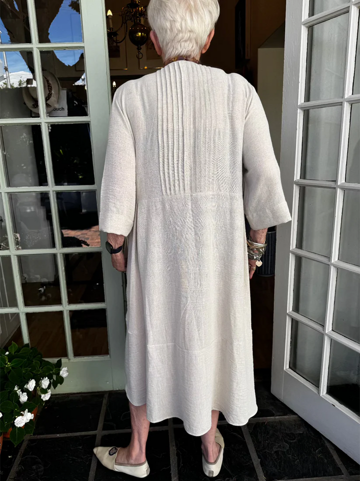 Robe en lin à ourlet irrégulier et plis accordéon