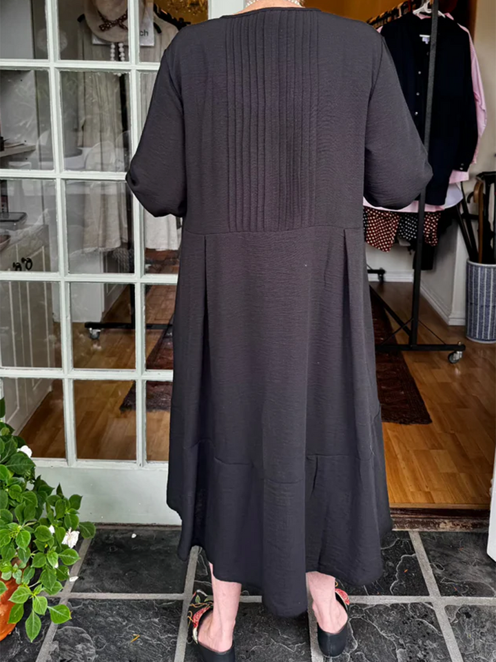 Robe en lin à ourlet irrégulier et plis accordéon